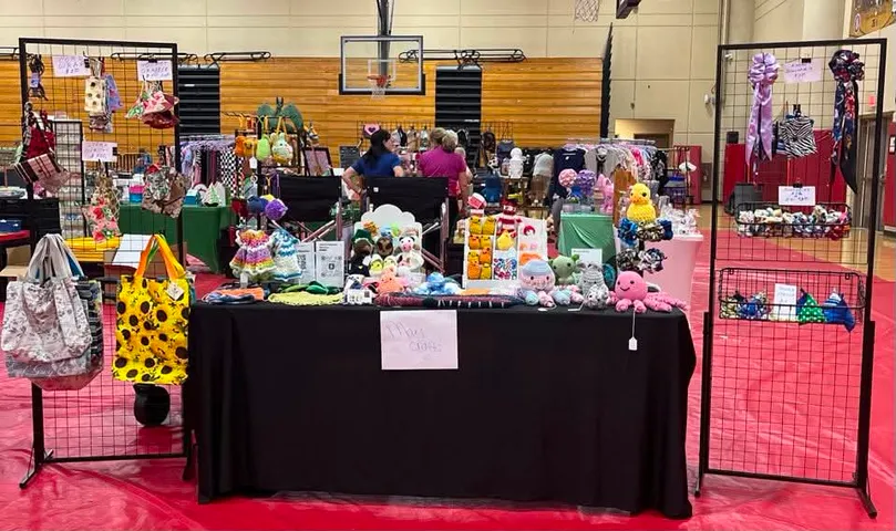 Mae's Handmade Crafts booth at local market